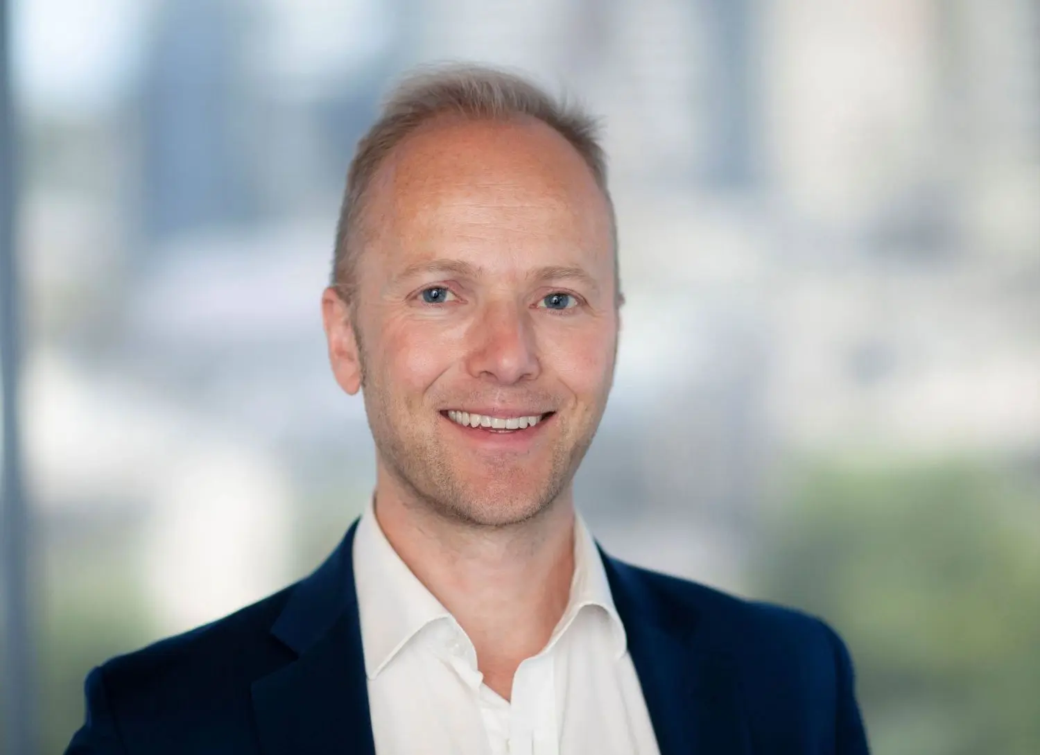 profile picture of Nik Andersen, providing client testimonial on international insurance programs